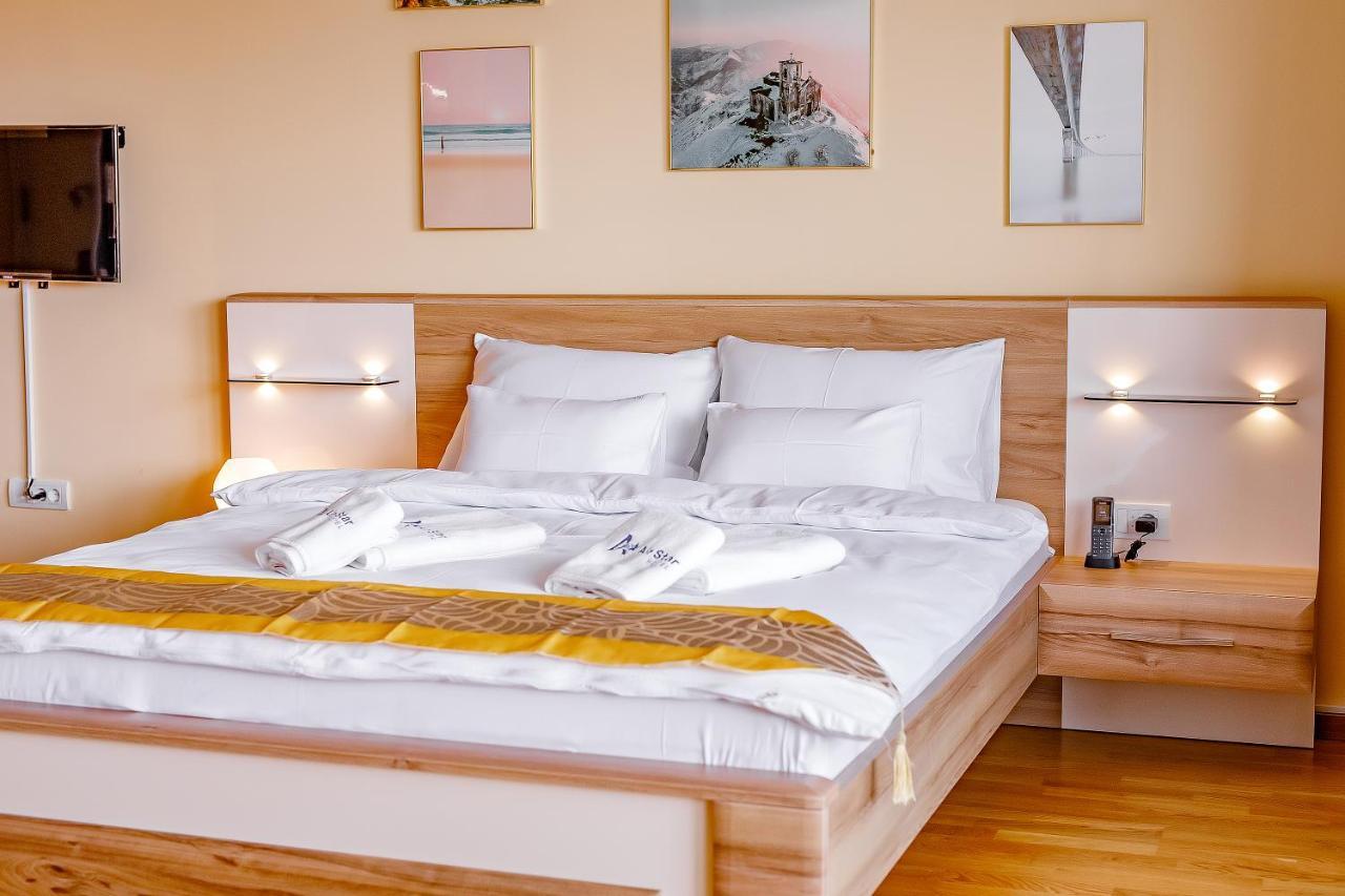 Готель Airstar Surcin Екстер'єр фото