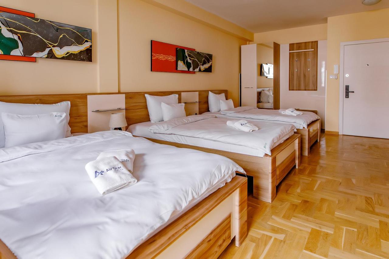 Готель Airstar Surcin Екстер'єр фото