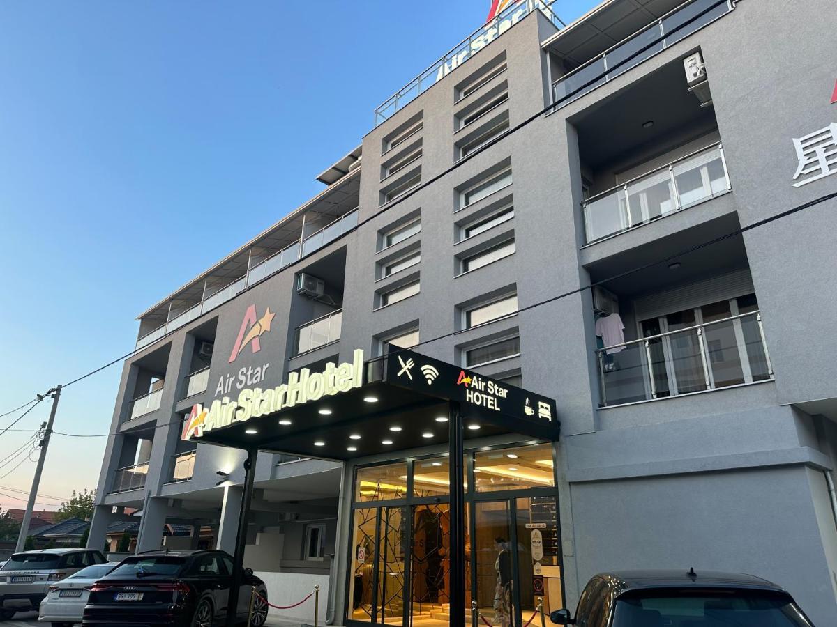 Готель Airstar Surcin Екстер'єр фото